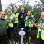 Southport u3a has unveiled a plaque at Hesketh Park in Southport to celebrate the success of its ‘Just One Thing’ gardening team. They included Group Leader Mary Mulholland; Hesketh Park Heritage Group Co-Chair Adrian Fletcher; Anne-Marie Furlong; Derek Hancox; June Forest; and Rick Cubells from Green Sefton. Photo by Andrew Brown Stand Up For Southport