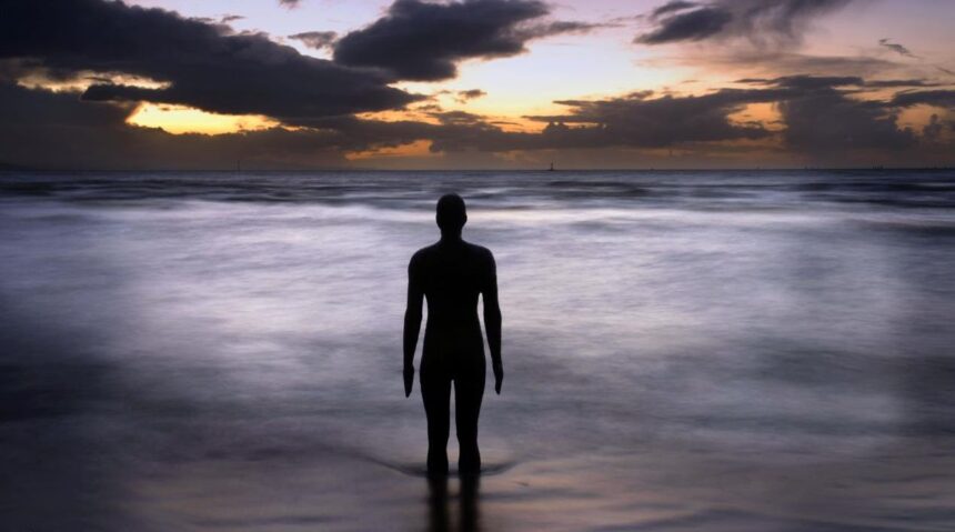 An exhibition has opened at The Atkinson in Southport dedicated to photographs of Crosby beach’s Iron Men, taken over two decades by photographer Ron Davies