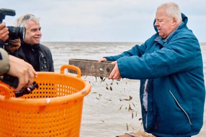 Southport fisherman Kevin Peet is filmed for a German TV documentary. Photo by George O'Connor