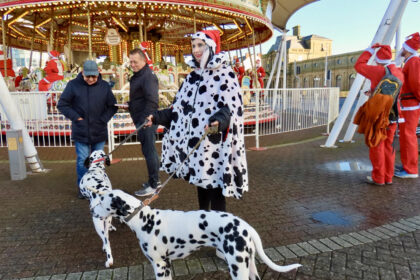 Tracy Hall and her Dalmatians are raising funds for Queenscourt Hospice at the Southport Santa Sprint. Photo by Andrew Brown Stand Up For Southport