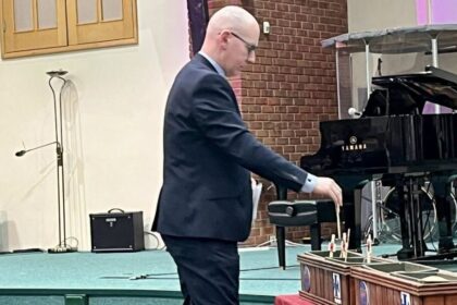 Guests attended the annual Sefton Holocaust Memorial Service at Christ Church in Southport. Southport MP Patrick Hurley pays his respects. Photo by Andrew Brown Stand Up For Southport