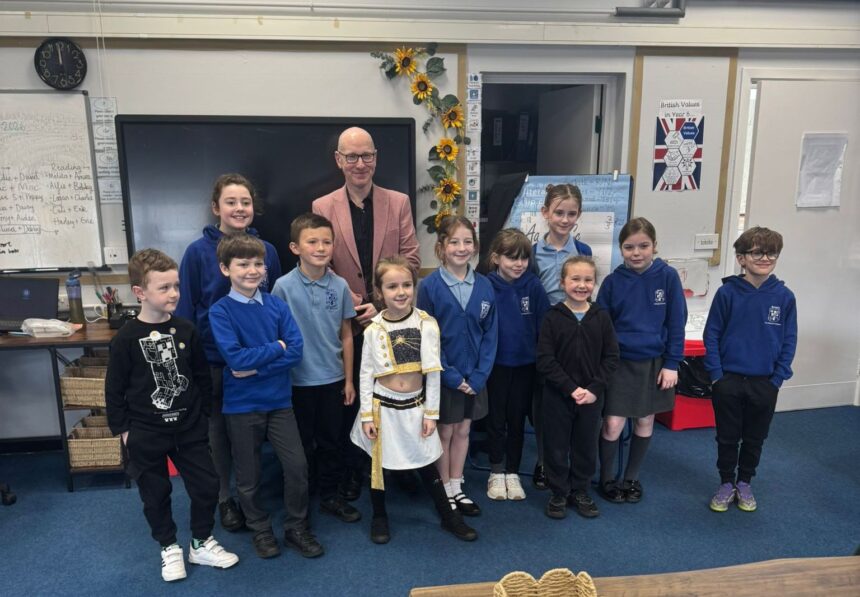 Southport MP Patrick Hurley visits a school in Southport