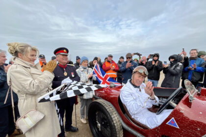 Crowds celebrated the return of the Sunbeam Tiger to Ainsdale Beach in Southport 100 years after it was driven by Sir Henry Segrave as he broke the world land speed record on 16th March 1926. The car was driven by Wing Commander Andy Green OBE. Photo by Andrew Brown Stand Up For Southport