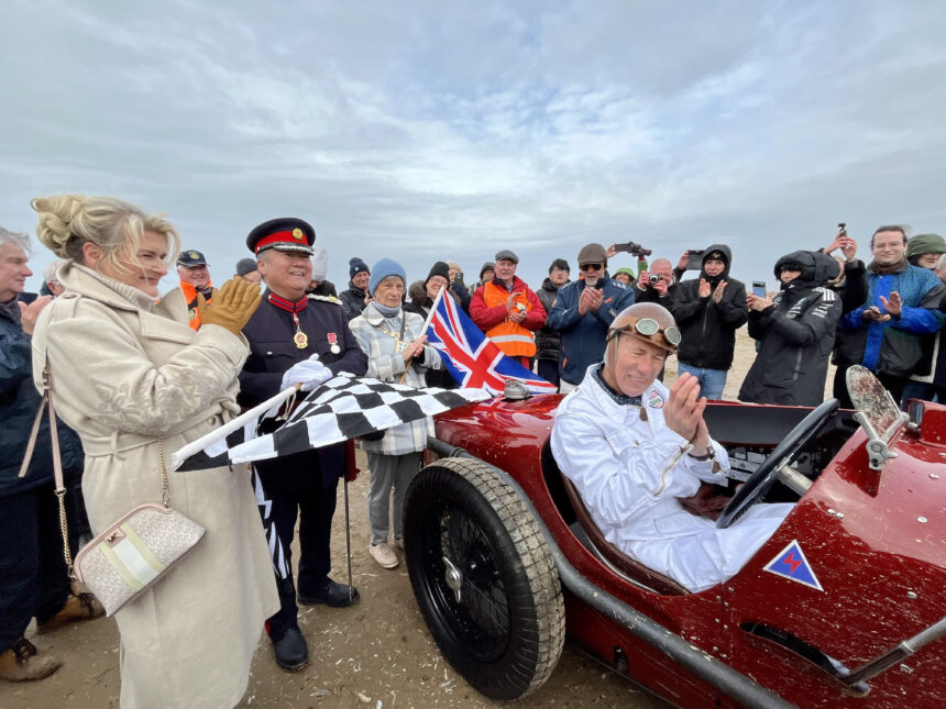 Crowds celebrated the return of the Sunbeam Tiger to Ainsdale Beach in Southport 100 years after it was driven by Sir Henry Segrave as he broke the world land speed record on 16th March 1926. The car was driven by Wing Commander Andy Green OBE. Photo by Andrew Brown Stand Up For Southport