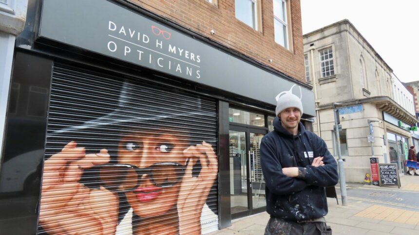 Artist Paul Curtis has created a new Sophia Loren mural on the shutters at David H Myers Opticians in Southport. Photo by Andrew Brown Stand Up For Southport