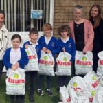 Children from St Patrick's Catholic Primary School in Southport are among those taking part in the Massams Supplies sunflower growing competition
