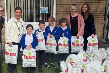 Children from St Patrick's Catholic Primary School in Southport are among those taking part in the Massams Supplies sunflower growing competition