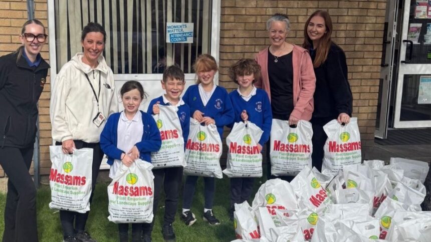 Children from St Patrick's Catholic Primary School in Southport are among those taking part in the Massams Supplies sunflower growing competition