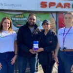 Queenscourt Hospice fundraisers with the team at SPAR on Ovington Drive in Kew in Southport