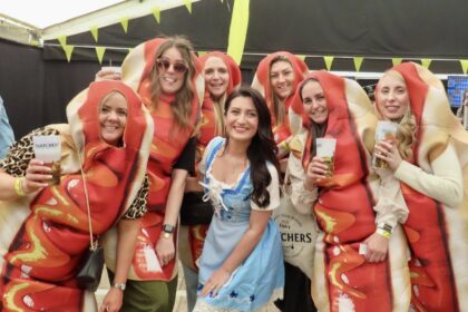 Hundreds of people enjoyed the first Southport Sausage and Cider Festival at Victoria Park in Southport. Kelly Stevens and friends came dressed as hotdogs, pictured with Kelly Bond. Photo by Andrew Brown Stand Up For Southport