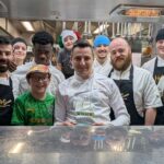 Jason Maimone (centre), the Head Chef at Volare Restaurant in Southport, has won the title of Up & Coming Chef at the UK Italian Awards 2026 while Volare has won Highly Recommended in the Best Restaurant in North West of England category