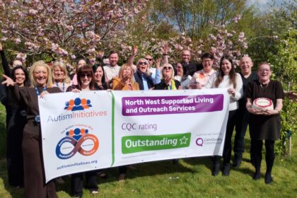 Staff celebrating their outstanding rating at WeGrow social enterprise  an outdoor market garden run by Autism Initiatives