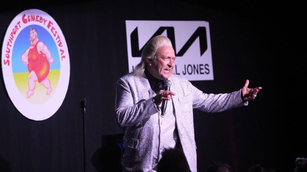 Clinton Baptiste on stage at the sold out performance of the 2025 Southport Comedy Festival
