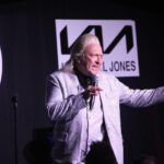 Clinton Baptiste on stage at the sold out performance of the 2025 Southport Comedy Festival