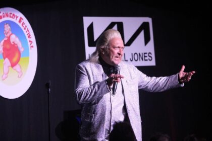 Clinton Baptiste on stage at the sold out performance of the 2025 Southport Comedy Festival