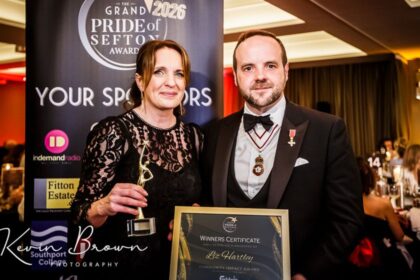 Queenscourt Hospice Fundraising Manager Liz Hartley has won the Sefton Community Impact Award at the 2026 Grand Pride Of Sefton Awards at The Grand in Southport. She was presented with her award by Merseyside Lord Lieutenant Peter Oliver OBE. Photo by Kevin Brown Photography