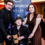 Penelope Vidal-Walsh was recognised with a Sefton Child Of Courage Award at the 2026 Grand Pride Of Sefton Awards as the watching audience cheered on at The Grand in Southport. Holly was presented with her Sefton Child Of Courage Award by Stephen Grayson from category sponsor Cooper Parry accountants. Photo by Kevin Brown Photography