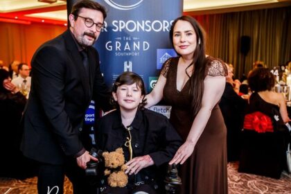 Penelope Vidal-Walsh was recognised with a Sefton Child Of Courage Award at the 2026 Grand Pride Of Sefton Awards as the watching audience cheered on at The Grand in Southport. Holly was presented with her Sefton Child Of Courage Award by Stephen Grayson from category sponsor Cooper Parry accountants. Photo by Kevin Brown Photography
