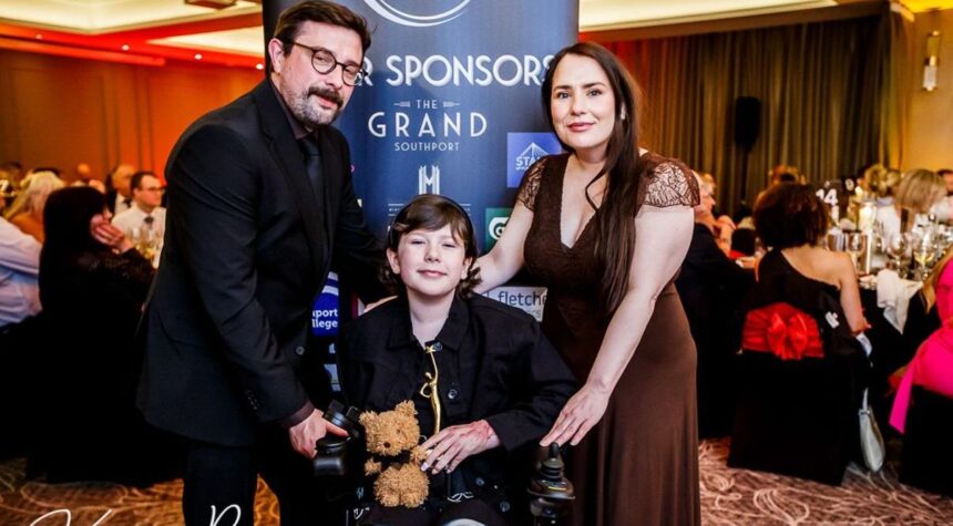 Penelope Vidal-Walsh was recognised with a Sefton Child Of Courage Award at the 2026 Grand Pride Of Sefton Awards as the watching audience cheered on at The Grand in Southport. Holly was presented with her Sefton Child Of Courage Award by Stephen Grayson from category sponsor Cooper Parry accountants. Photo by Kevin Brown Photography