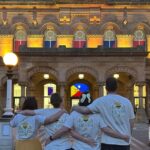 Bebe's Hive supporters in front of The Atkinson in Southport which was lit yellow in honour of Bebe King