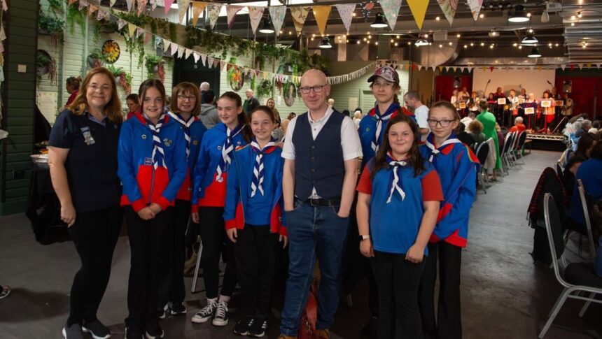 People gathered to enioy The Great Big Green Lunch at Southport Market. Photo by The Hearth CIC