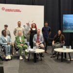 BACK ROW l-r: Terri Balon, Regional Campaigns Officer, RNIB, Chris Massam  Accessibility Lead, Everton Football Club Stadium, Niamh Parrington  Visitor Experience Manager, Eureka!, Rio Boothe  Para-athlete and Content Creator. FRONT ROW: Lord Mayor of Liverpool, Councillor William Shortall, Ade Adepitan MBE  Paralympian and broadcaster (Host), Clare Briegal MBE  Chair of Sport Liverpool and sports representative for the LCRDP Board, Ross Calladine  Accessibility and Inclusion Lead, VisitEngland, Amy Truesdale MBE  Paralympic Taekwondo Champion, David Clarke OBE, PLY  CEO ParalympicsGB