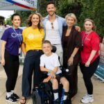 From left are Esme (Rainbow Hub) Emma Parish (Rainbow Hub) Scott Thomas, Kirsty Thomas Horton (Fletchers) and Sarah (Rainbow Hub) with Cole (front)