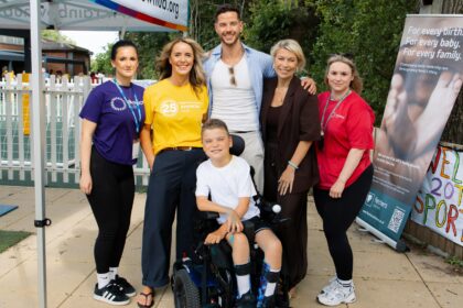 From left are Esme (Rainbow Hub) Emma Parish (Rainbow Hub) Scott Thomas, Kirsty Thomas Horton (Fletchers) and Sarah (Rainbow Hub) with Cole (front)