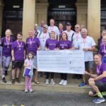 A group of Southport Freemasons walked from Liverpool to Southport to raise £42,000 for Queenscourt Hospice