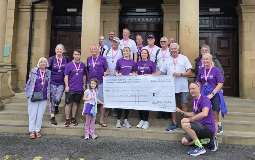 A group of Southport Freemasons walked from Liverpool to Southport to raise £42,000 for Queenscourt Hospice