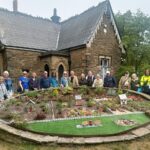 The Southport U3A Just One Thing Hesketh Park Garden group presented a £250 cheque raised by members to Hesketh Park Heritage Group Co-Chair Adrian Fletcher