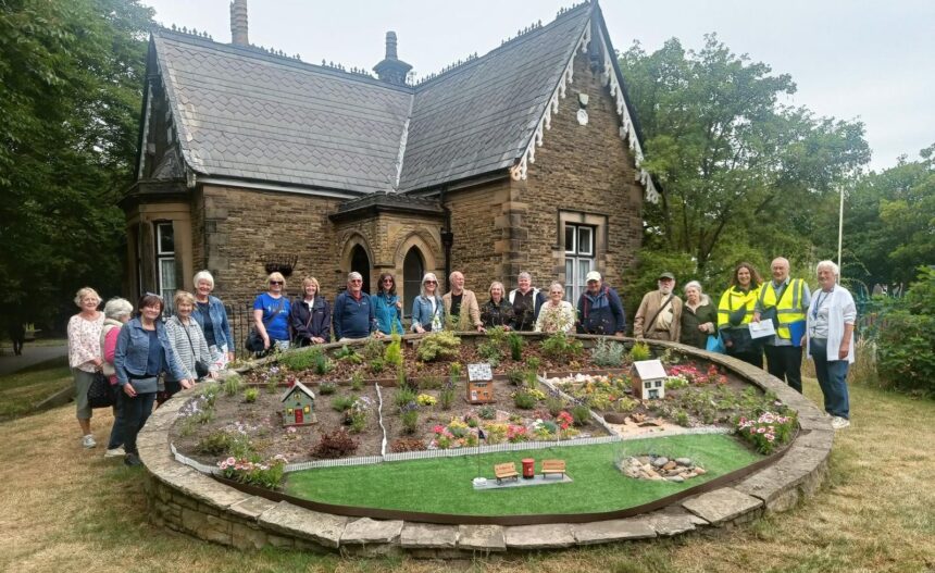 The Southport U3A Just One Thing Hesketh Park Garden group presented a £250 cheque raised by members to Hesketh Park Heritage Group Co-Chair Adrian Fletcher