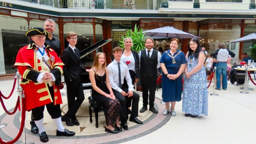 The official launch of the Wayfarers Community Piano donated by Claire Kelly owner of Southport Piano Academy at Wayfarers Arcade in Southport. Photo by Andrew Brown Stand Up For Southport