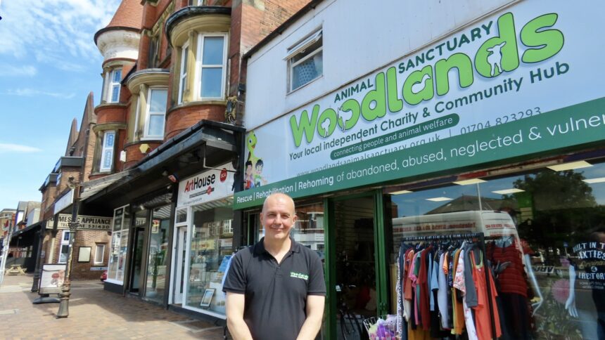 The Woodlands Animal Sanctuary community hub is operating on Eastbank Street in Southport. Retail assistant Marc Lewis. Photo by Andrew Brown Stand Up For Southport