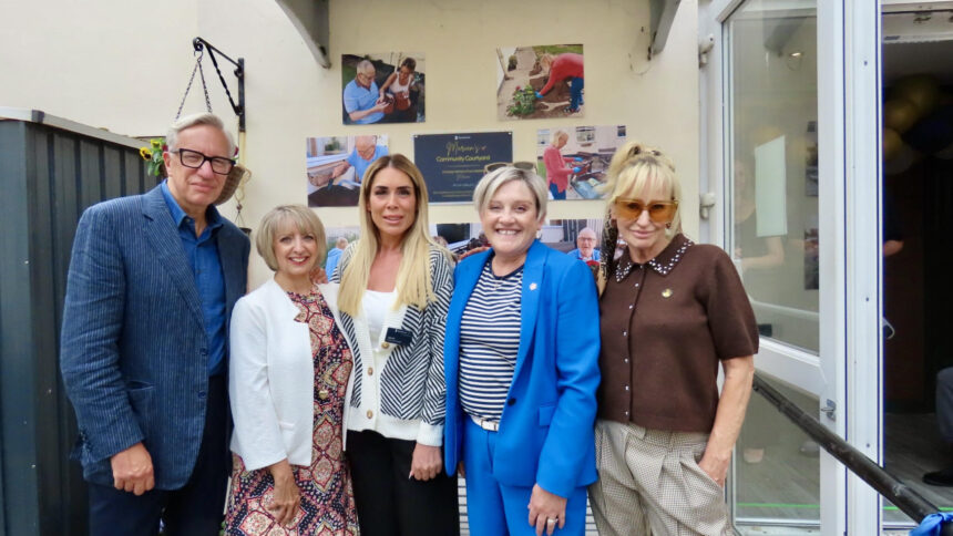 A garden created from a family's simple act of kindness has officially opened at Dovehaven House in Southport. Marian's family, Ashley Dalton MP, & Home Manager Laura Cowen. Photo by Andrew Brown Stand Up For Southport