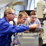 Young people learning in the workplace through the Elevate Education Business Partnership's (EBP) work experience programme