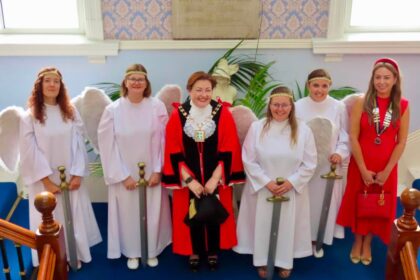 Mayor of Sefton Cllr Jen Corcoran (centre) with Southport Royal British Legion President Serena Silcock-Prince (right) and the Angels Of Mons at The Battle Of Mons commemoration in Southport. Photo by Andrew Brown Stand Up For Southport