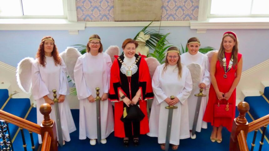 Mayor of Sefton Cllr Jen Corcoran (centre) with Southport Royal British Legion President Serena Silcock-Prince (right) and the Angels Of Mons at The Battle Of Mons commemoration in Southport. Photo by Andrew Brown Stand Up For Southport
