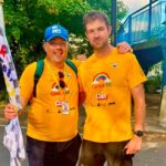 Fundraising champion Alex Rigby (right) has raised £30 for the Centre 56 charity through his Running the Railways - On The Hour challenge. He is pictured with Greg Suligowski from Merseyrail, which supported his fundraiser
