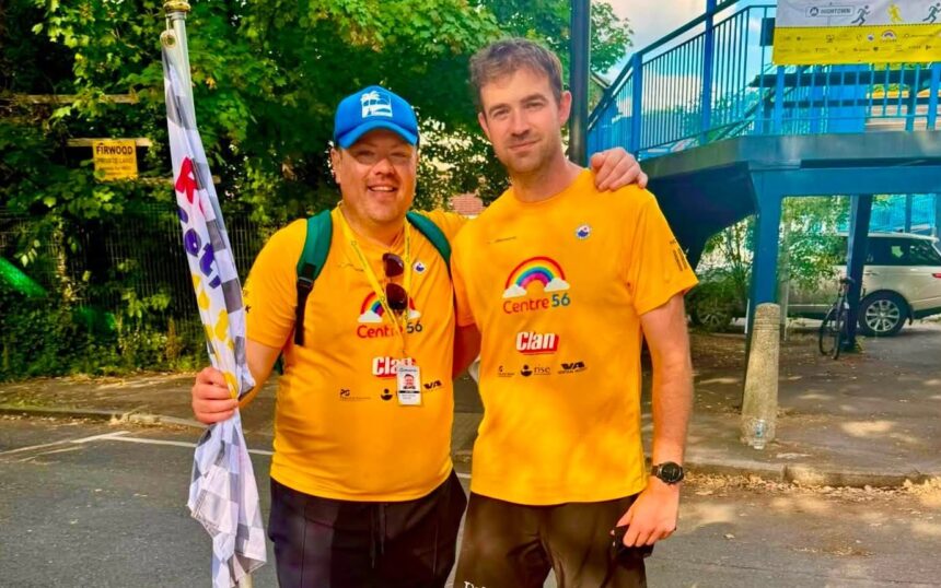 Fundraising champion Alex Rigby (right) has raised £30 for the Centre 56 charity through his Running the Railways - On The Hour challenge. He is pictured with Greg Suligowski from Merseyrail, which supported his fundraiser