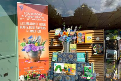 The Waterstones book in Southport has unveiled a Southport Flower Show window display. Photo by Andrew Brown Stand Up For Southport