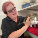 Lynn Jefferson is pictured with Ivy, one of several pregnant rescues currently under Woodlands' care