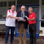 President Ted Morrell hands Nigel and Haydn their 1st4Sport Level 2 Award in Coaching certificates