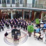 The SingMe Merseyside Choir led by Billy Hui BEM entertained shoppers at Wayfarers Arcade in Southport. Photo by Andrew Brown Stand Up For Southport