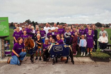 Michelle Foster led the Big Cricket Club Walk fundraiser in Southport. Photo by Michelle Foster