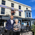 The new Talkin' Tables initiative is coming to The Bold on Lord Street in Southport. Mikhail Hotel And Leisure Group Cluster Manager James Bretnall-Bennett with Dorothy Livesey from Talkin' Tables. Photo by Andrew Brown Stand Up For Southport