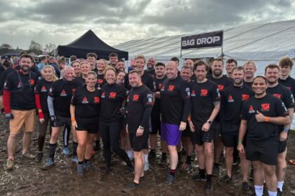 A team of 30 determined fundraisers from EFT Group in Southport have completed Tough Mudder
